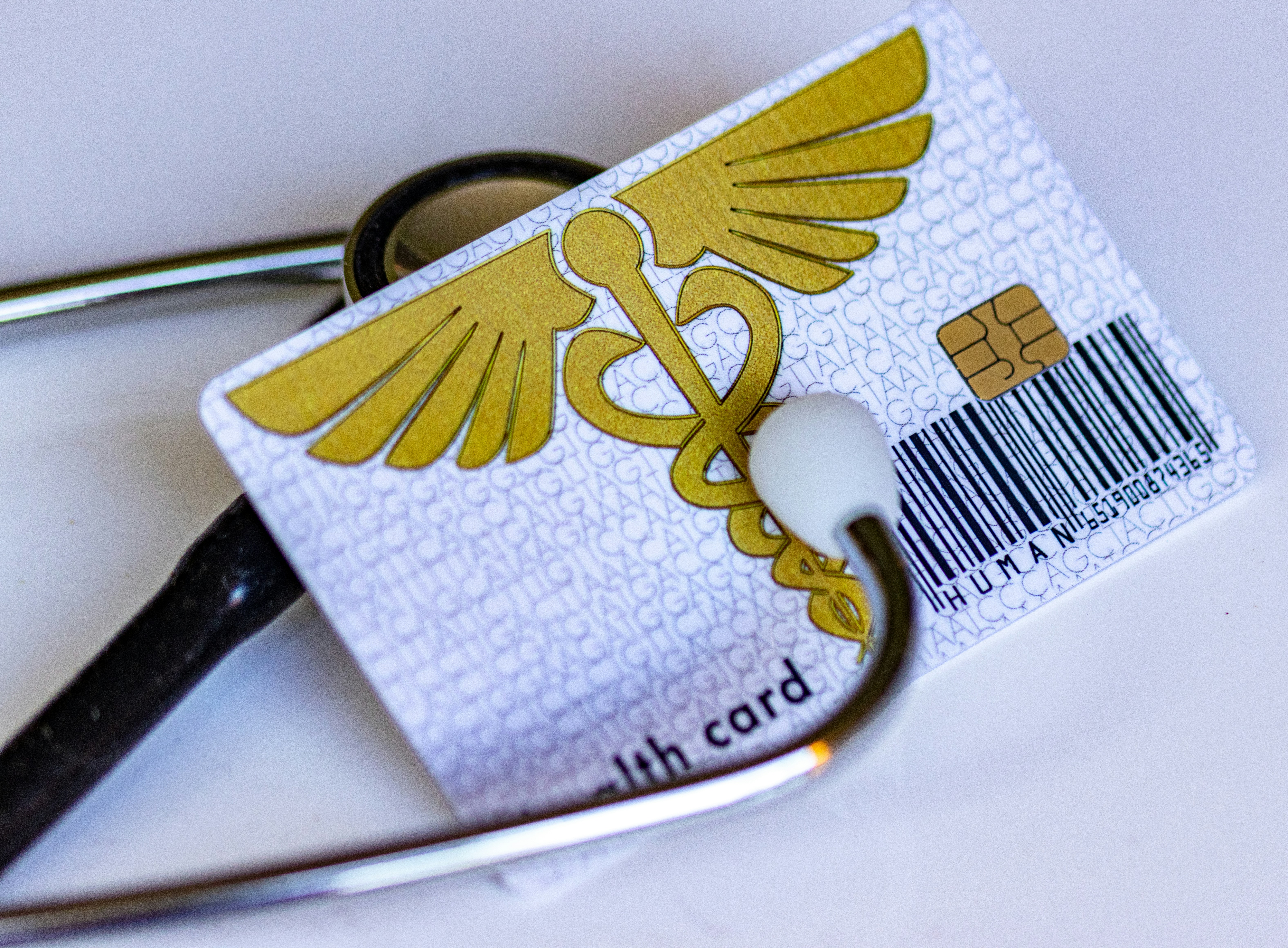 a health card and a stethoscope